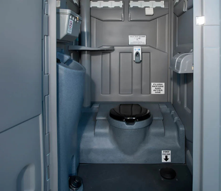 inside of a deluxe portable restroom